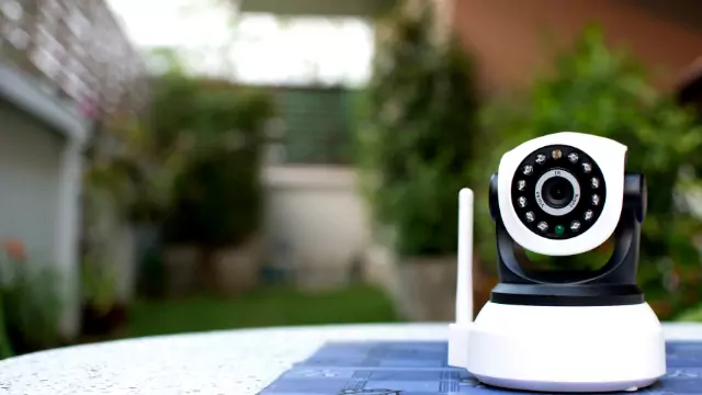 Compact indoor plug-in smart security camera